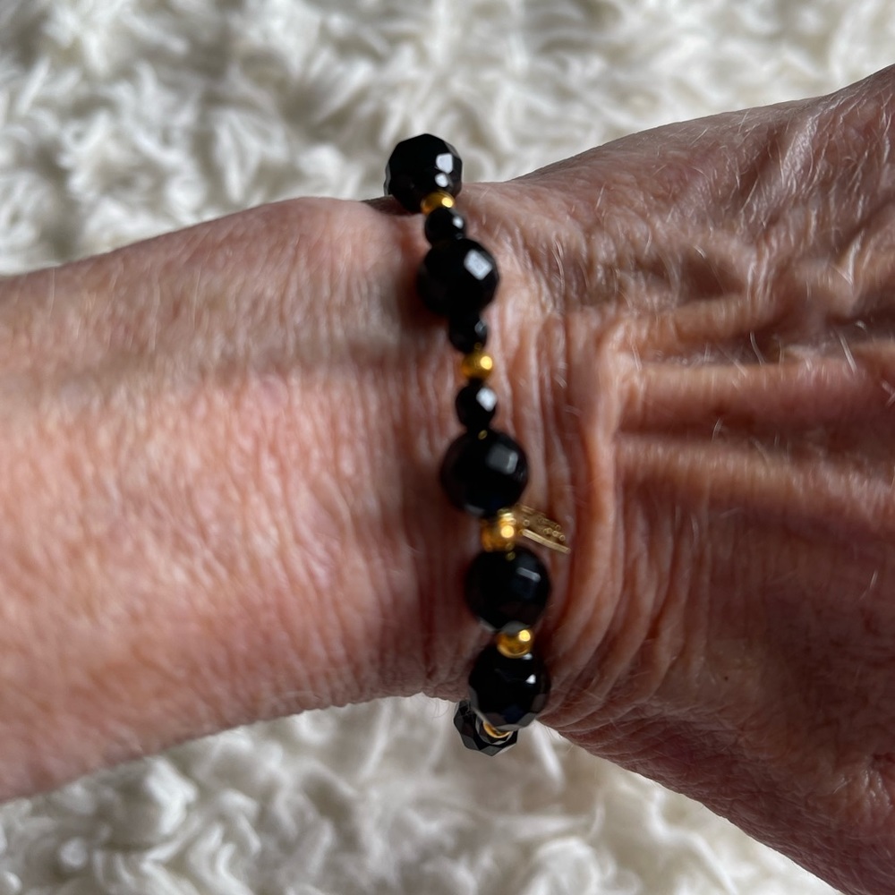 Sterling silver brass and black onyx bracelet